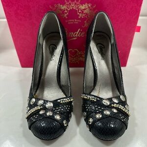 Candie’s Daylo black faux-snakeskin studded pumps